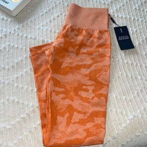 NVGTN camo seamless orange leggings